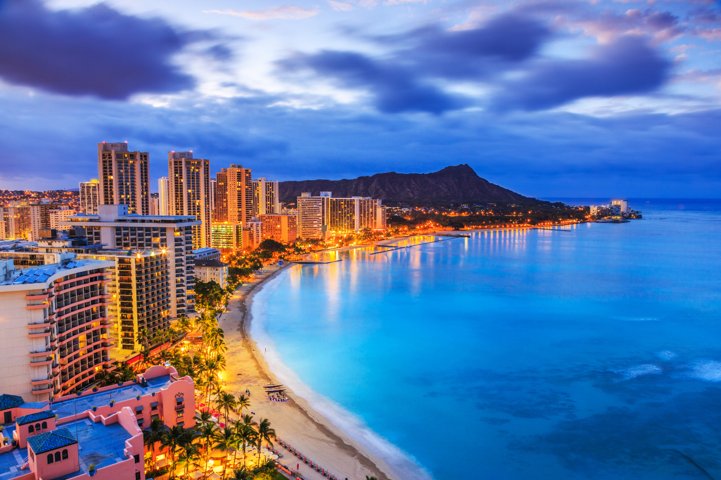 Beautiful sunset over a Hawaiian beach showcasing the serene lifestyle.