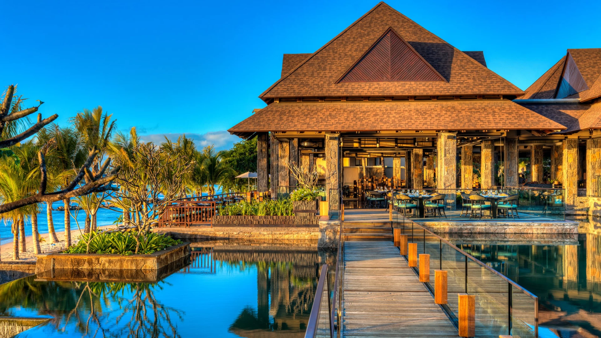 Stunning view of Turtle Bay Resort with oceanfront accommodations and lush tropical landscape.